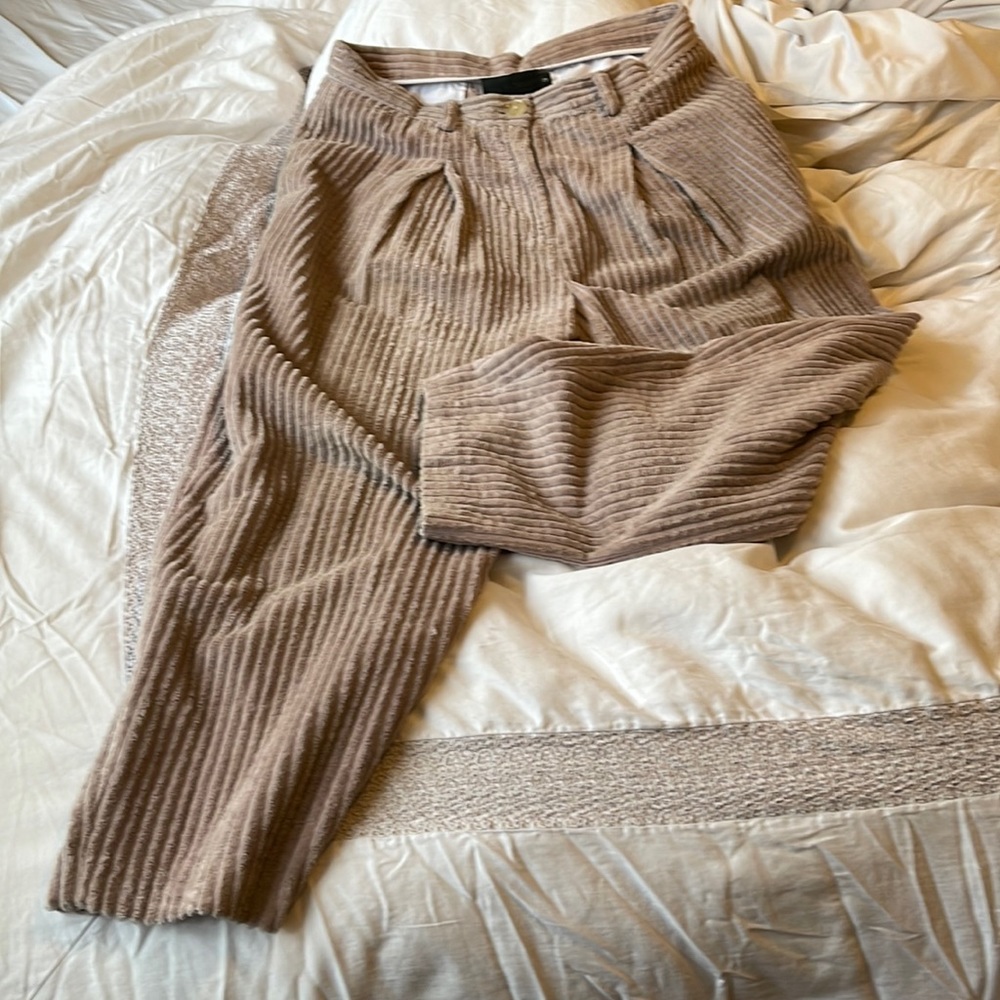No. 6 pants 100% cotton. Lining is 50% cotton and polyester.